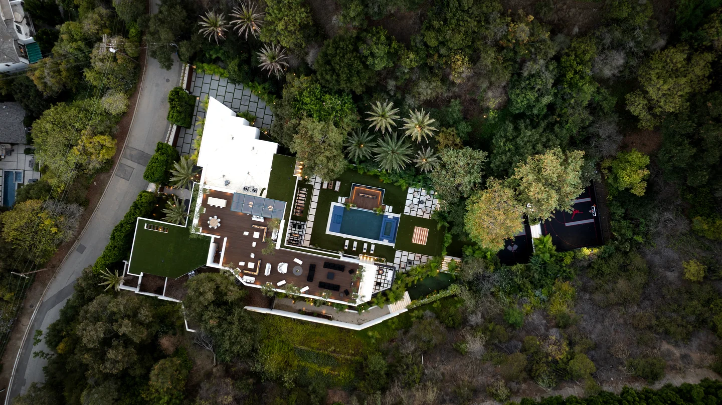 Overhead view of Chalon Road showing the house, terraces, pool, planted roofs and surrounding hillside.