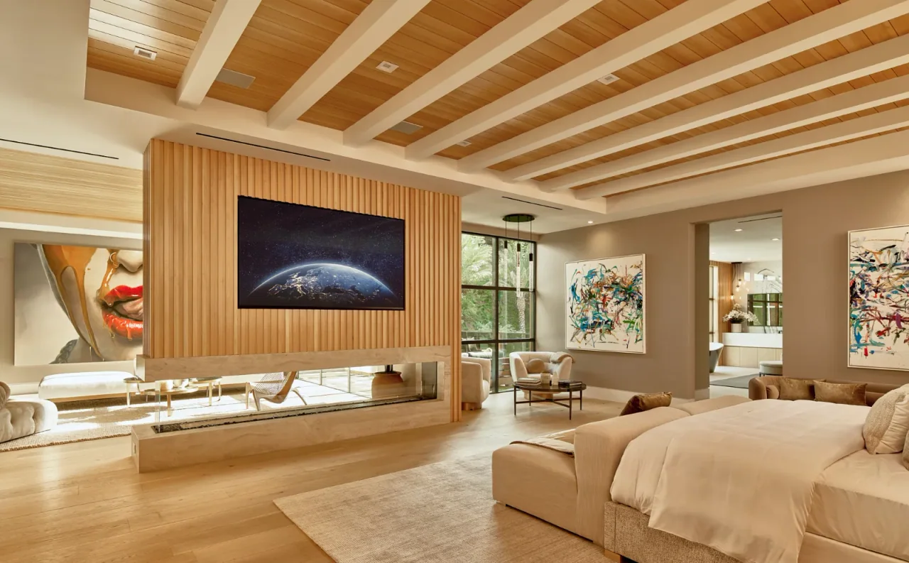 Bedroom with coffered ceiling and fireplace at Chalon Road.