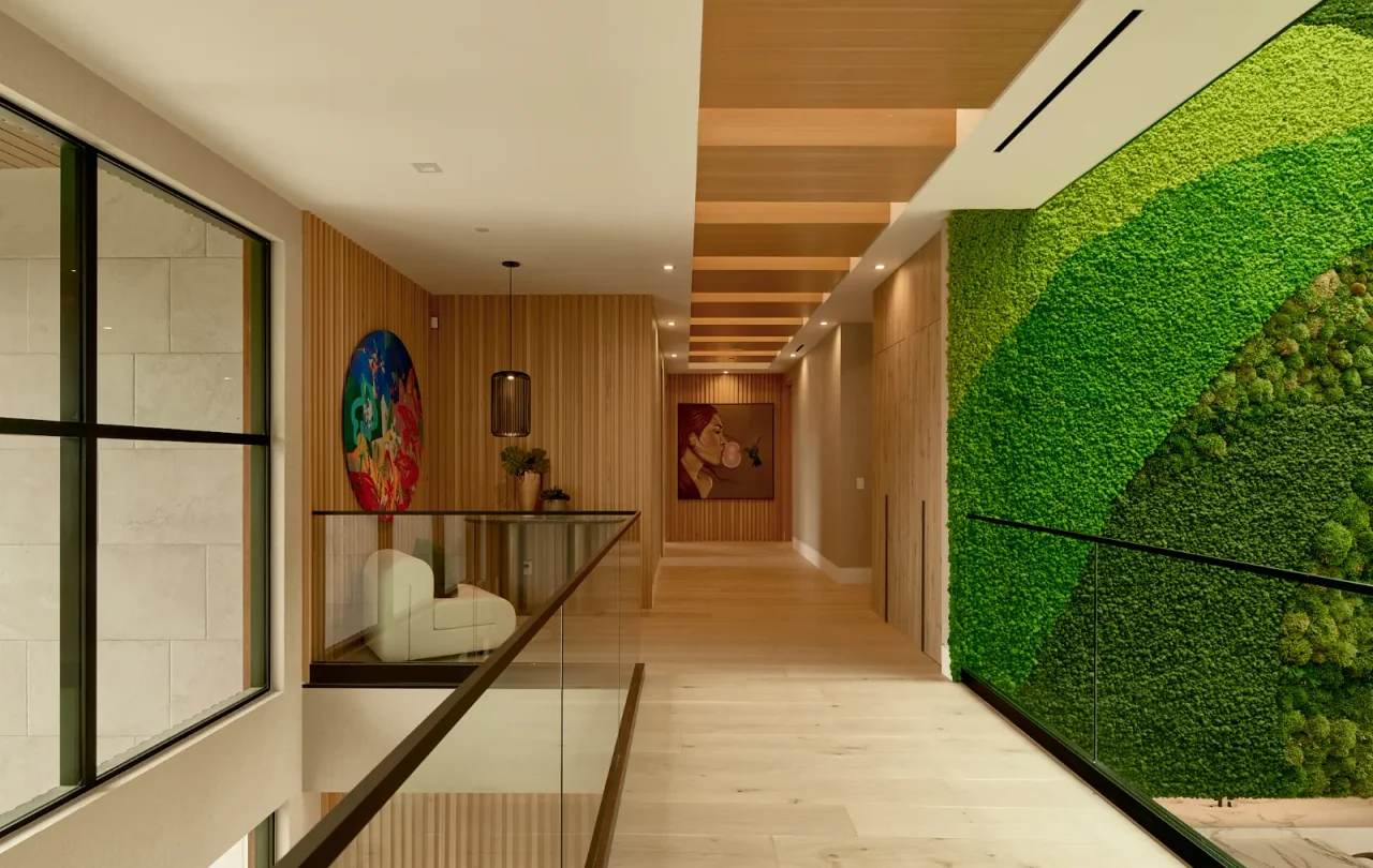 Upper hallway beside a planted wall at Chalon Road.