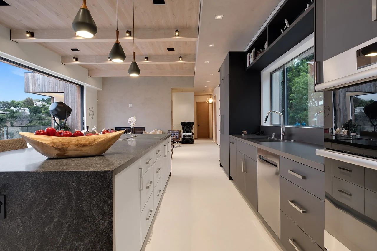 Island countertop and dark cabinetry at Dixie Canyon.