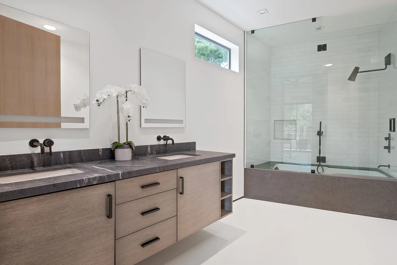 Vanity beside a glass shower at Dixie Canyon.