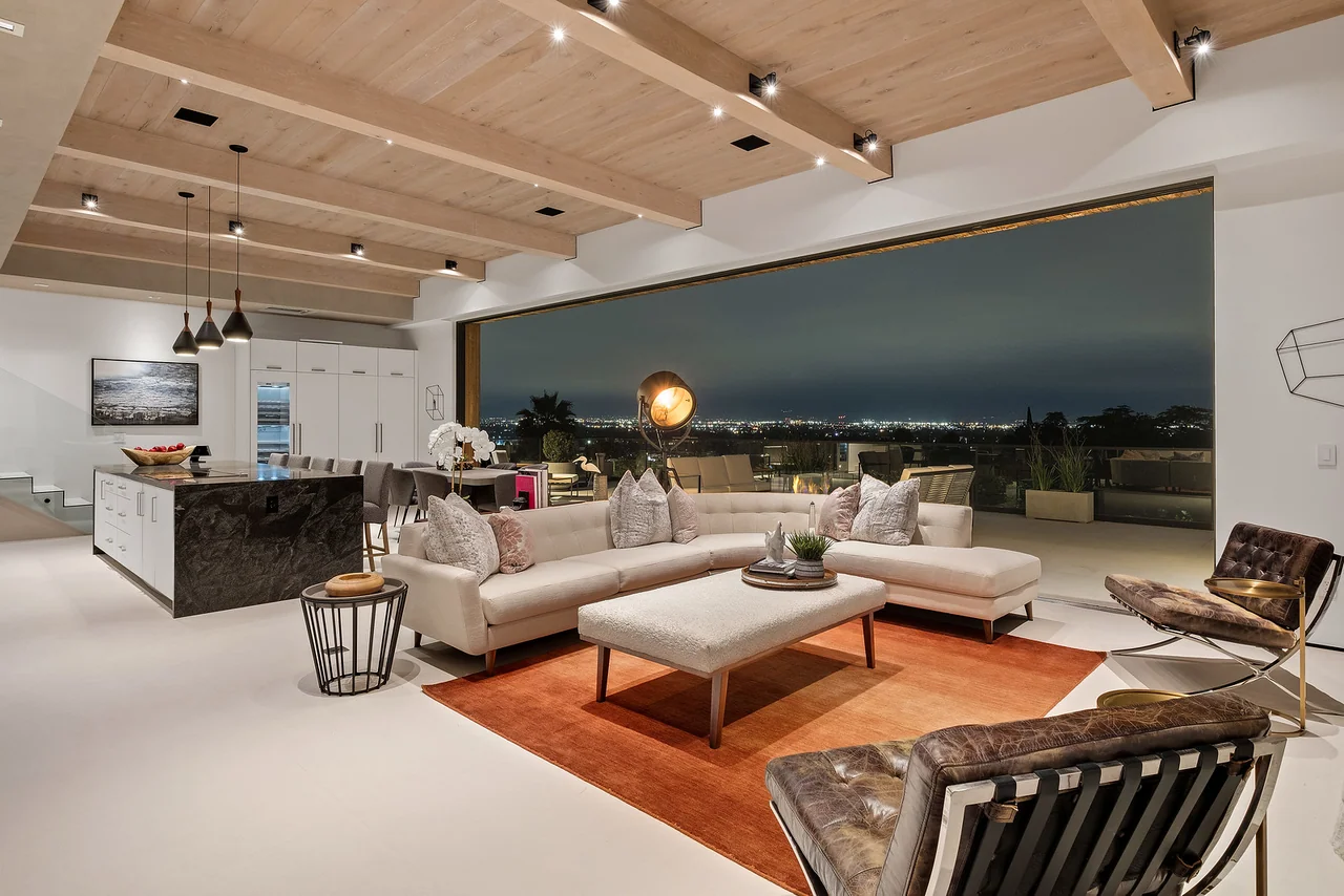 Living room with full-height sliding doors at Dixie Canyon.