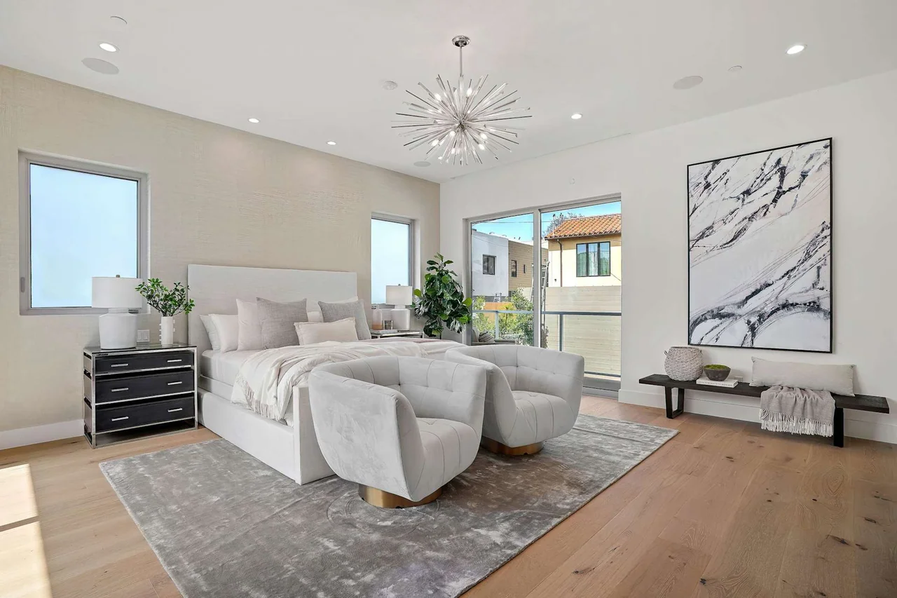 Bedroom with garden-facing doors at Fairburn Avenue.