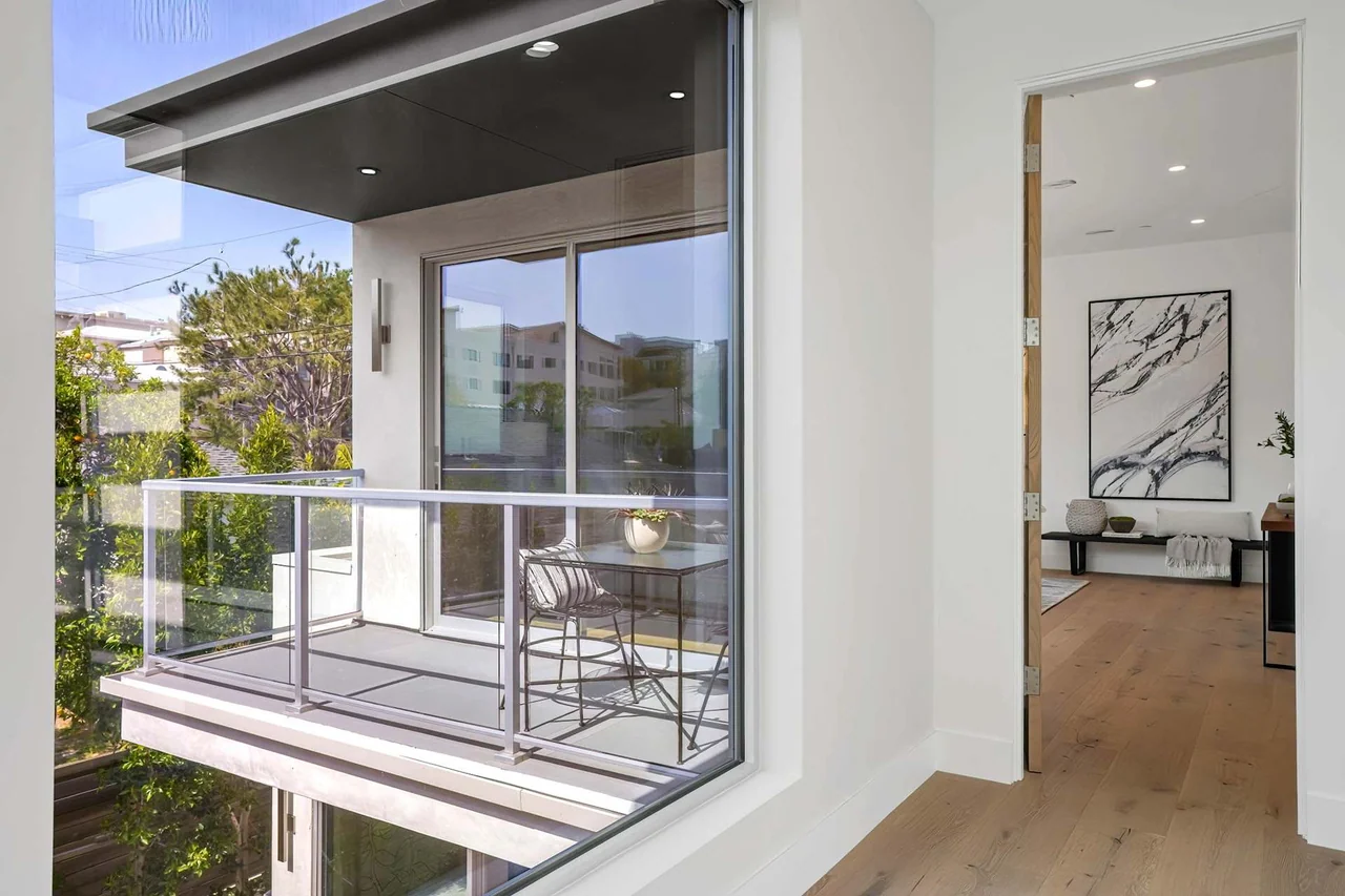 Bedroom balcony and glass railing at Fairburn Avenue.