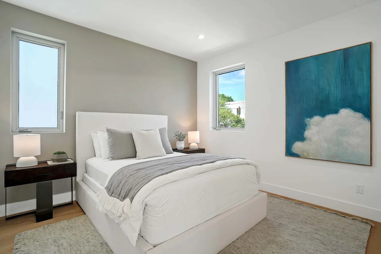 Bedroom with paired windows at Fairburn Avenue.