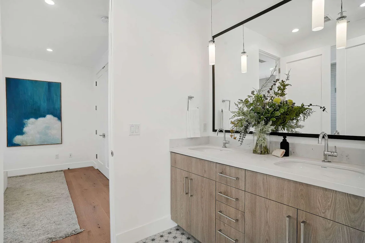 Bathroom vanity beside a doorway at Fairburn Avenue.