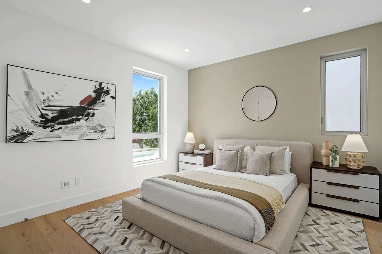 Bedroom with tall doors at Fairburn Avenue.