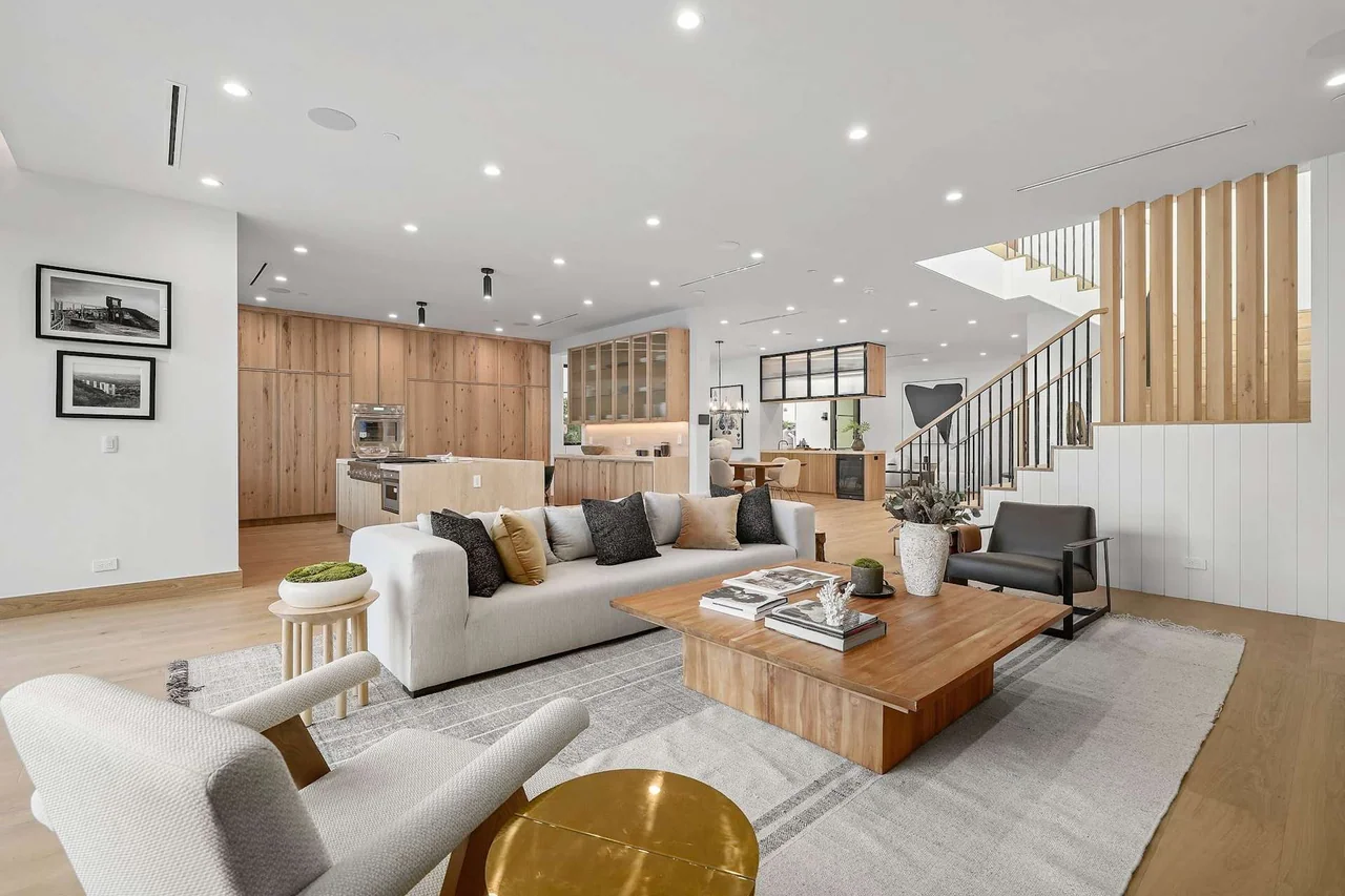 Living room with timber wall panels at South Gretna Green Way.