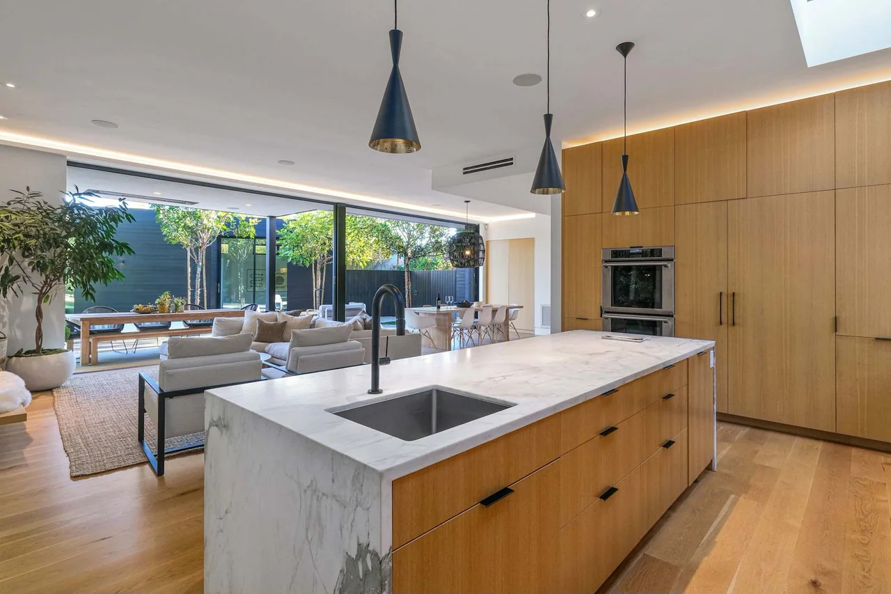 Kitchen island with sink and timber drawers at Halderman Street.