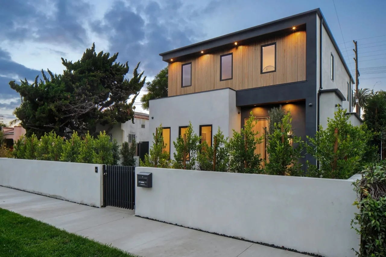 House behind a planted front wall at Nowita Place.
