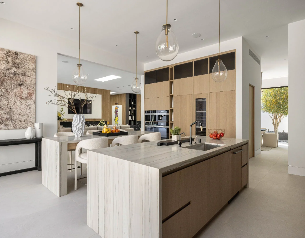 Kitchen worktop and tall cabinet wall at Petit Avenue.
