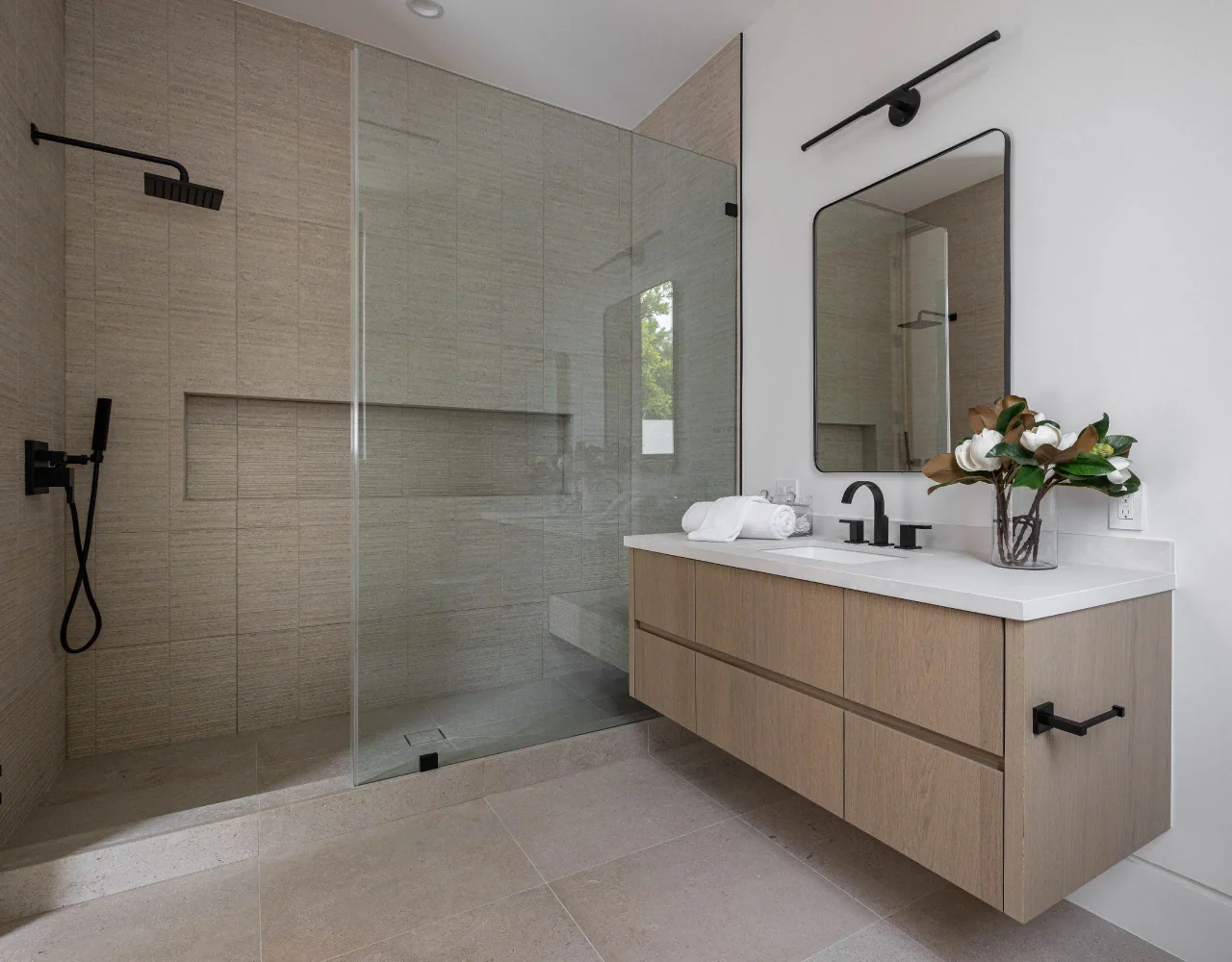 Bathroom with floating vanity at Petit Avenue.