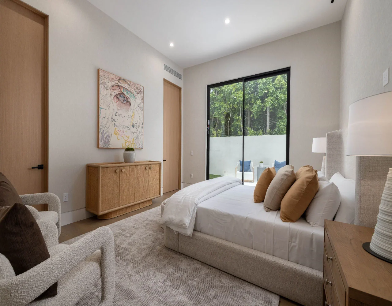 Bedroom with timber storage at Petit Avenue.