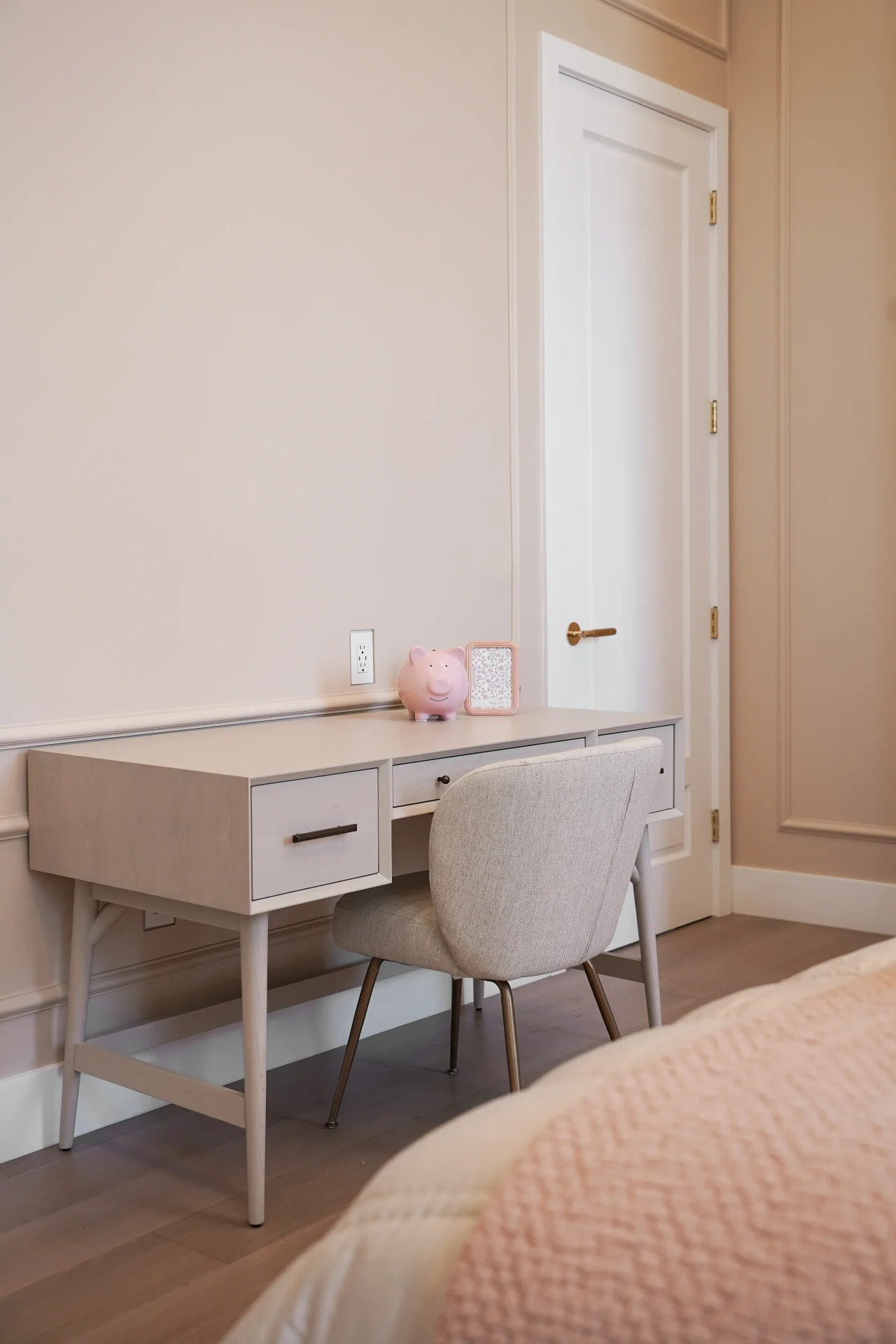 Desk beside a paneled wall at Rio Flora Place.