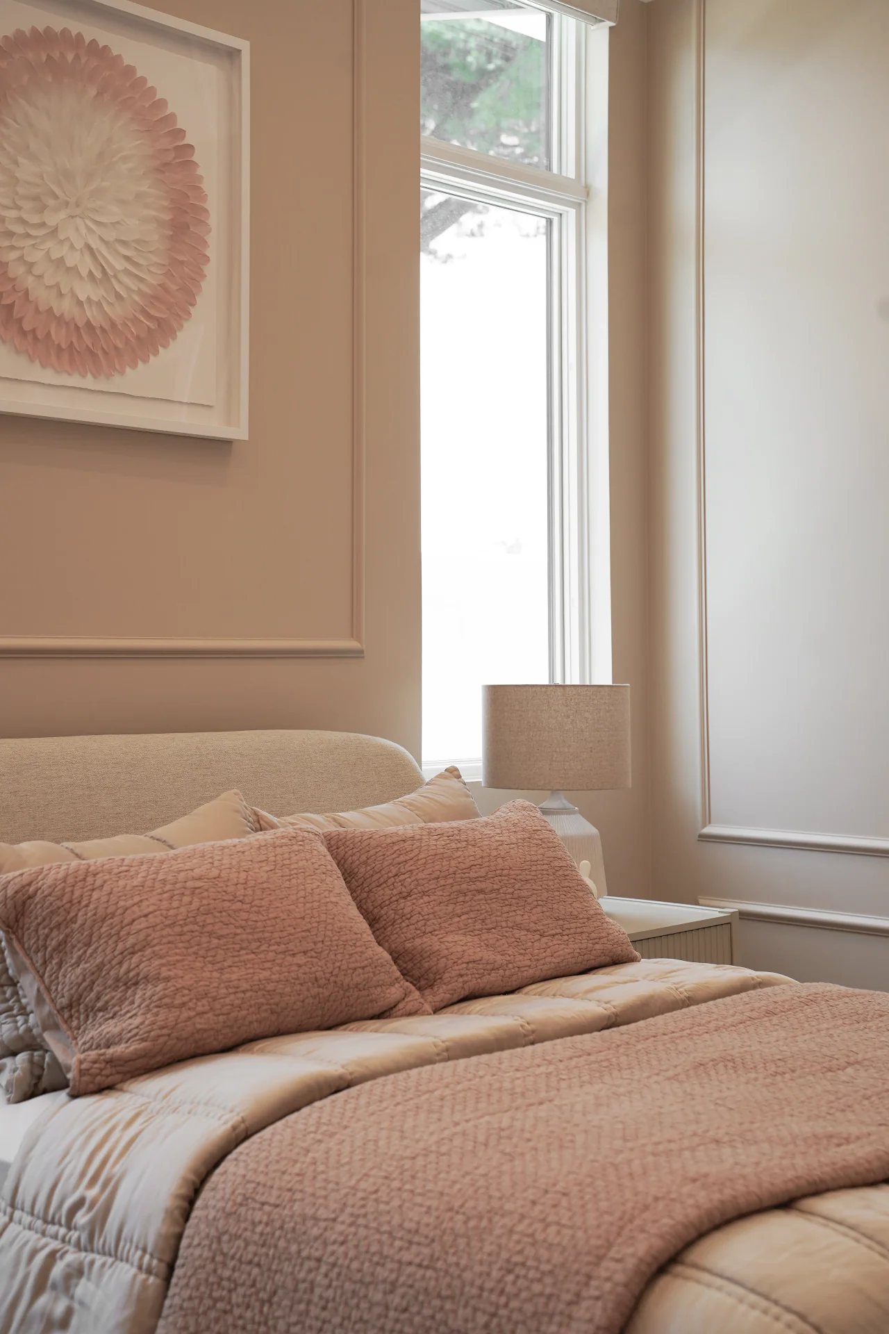 Bedroom with soft wall panels at Rio Flora Place.