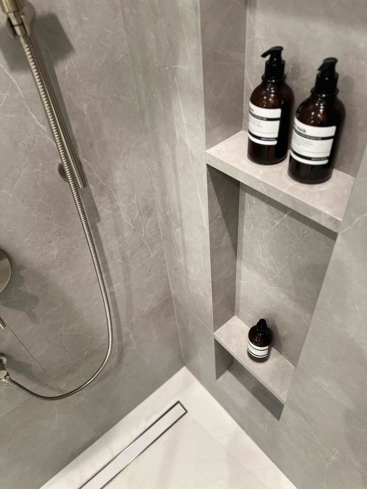 Shower shelf and hand shower at Rio Flora Place.