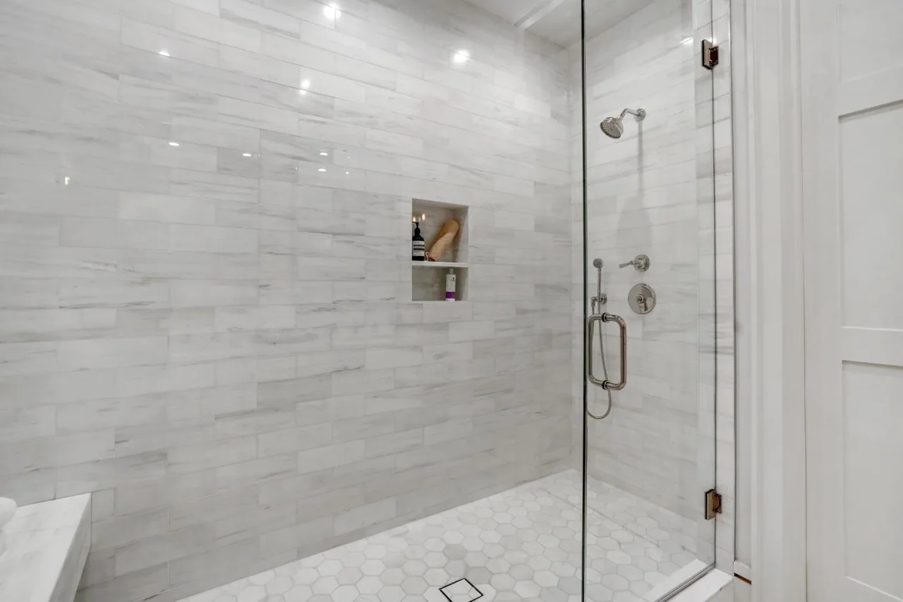 Glass shower and wall niche at South Bundy Drive.