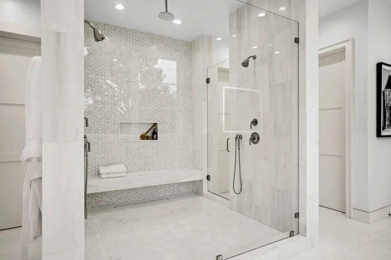 Shower enclosure with stone wall at South Bundy Drive.